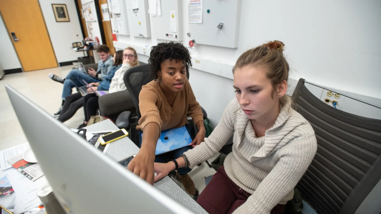 Students work together on a project.