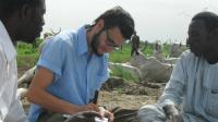 Daniel Ewing interviewing herders.